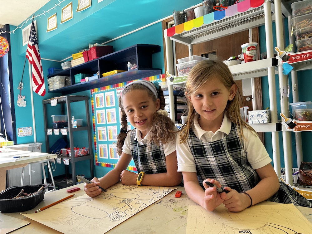 Lower School students working at their desks